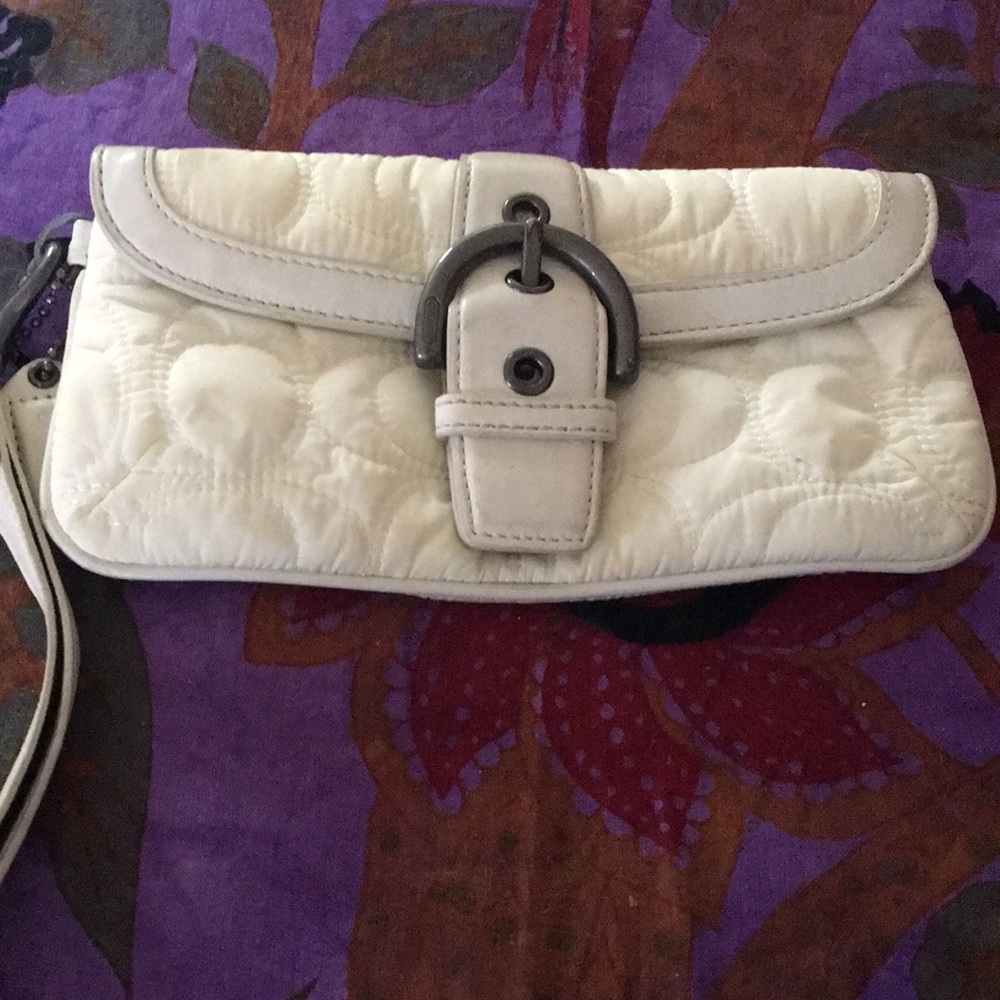 Quilted Coach wristlet.
